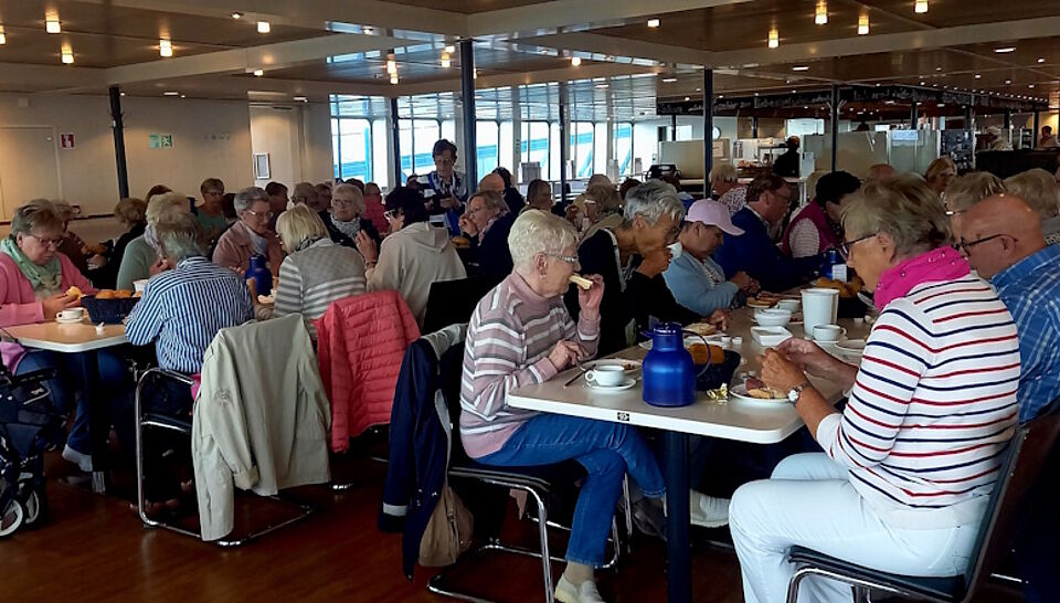Reisegruppe in Restaurant